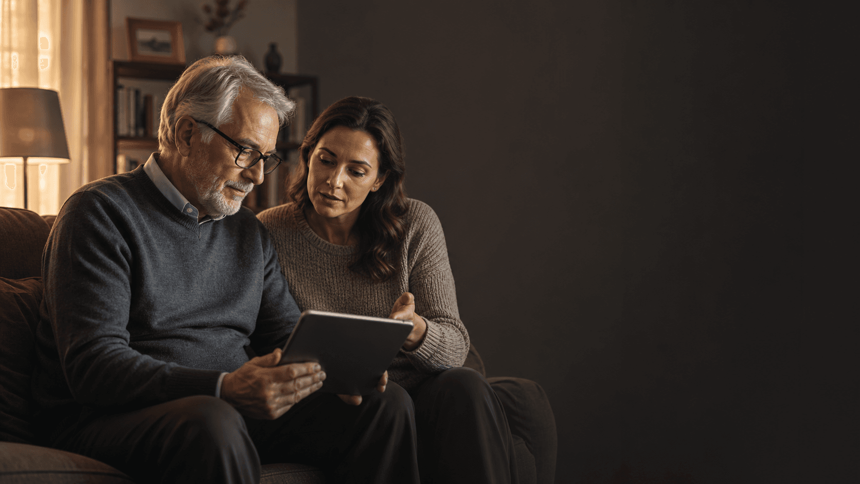 An older adult and family member naturally reviewing a research timeline together on a tablet